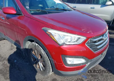 2015 Hyundai Santa Fe Sport 2.4L from USA, damaged, VIN 5XYZUDLB2FG249273